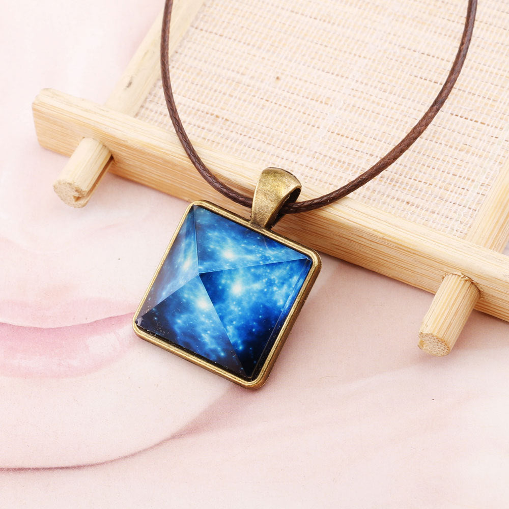 Pyramid glow-in-the-dark pendant - Concordia Style Boutique
