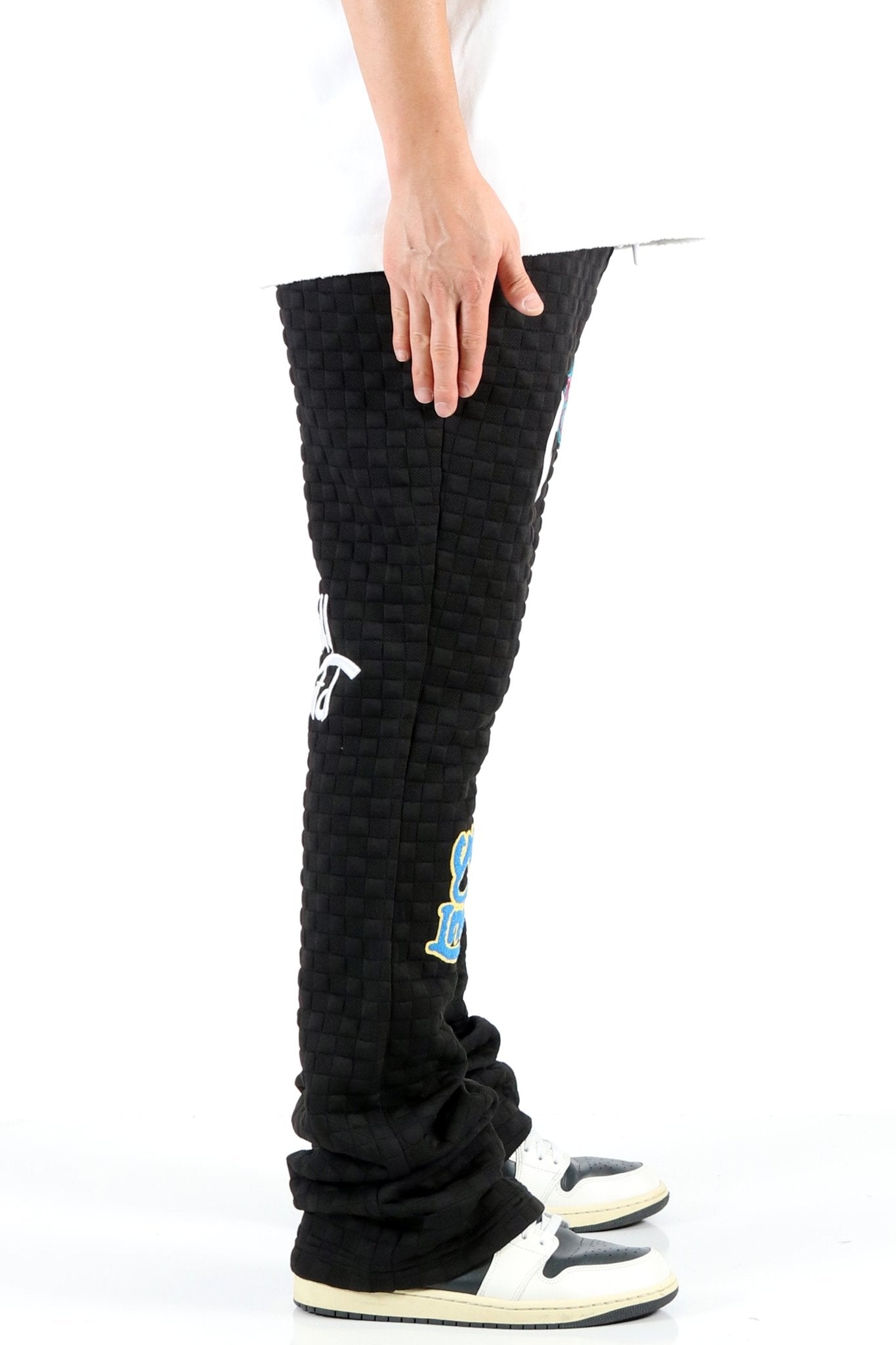 KUROI Waffle fleece graphic skinny flare stacked pants - Concordia Style Boutique