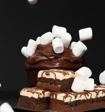 Frosted Marshmallow Brownie Bars - Concordia Style Boutique