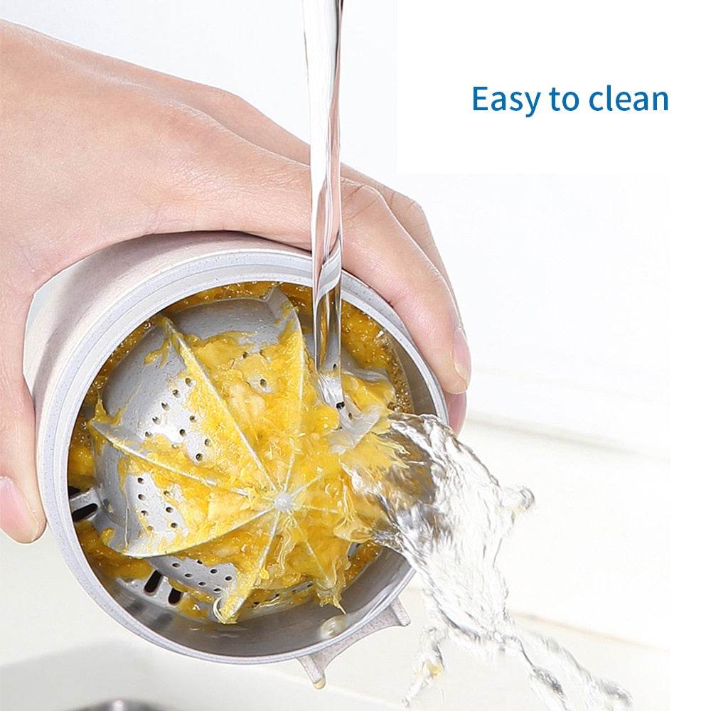 Portable Manual Citrus Juicer - Concordia Style Boutique