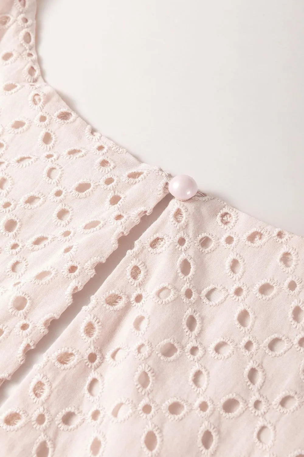 Embroidered Eyelets Ruffled Hem Sleeveless Mini Dress - Concordia Style Boutique