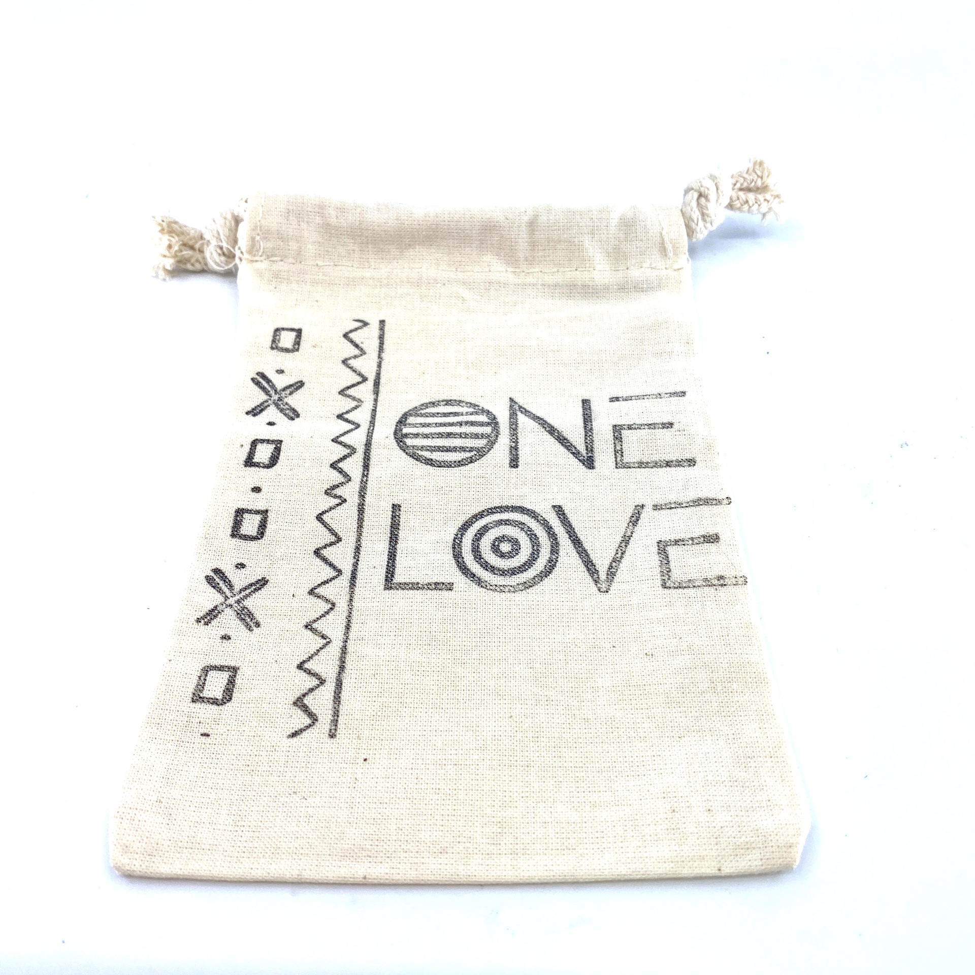 Hand Stamped, One Love, Cotton Drawstring Pouch - 4" x 6" - Premium Cotton Drawstring Pouch from Concordia Style Boutique - Just $12! Shop now at Concordia Style Boutique