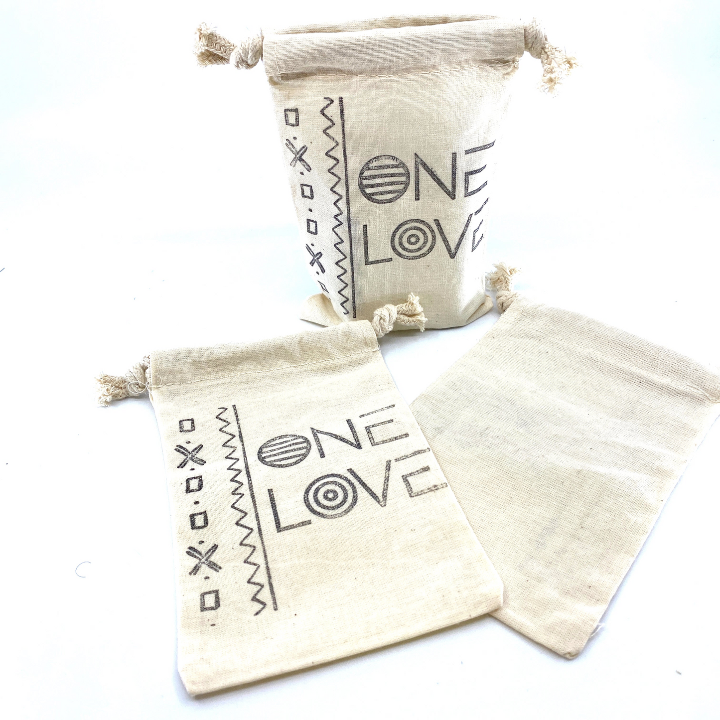 Hand Stamped, One Love, Cotton Drawstring Pouch - 4" x 6" - Premium Cotton Drawstring Pouch from Concordia Style Boutique - Just $12! Shop now at Concordia Style Boutique