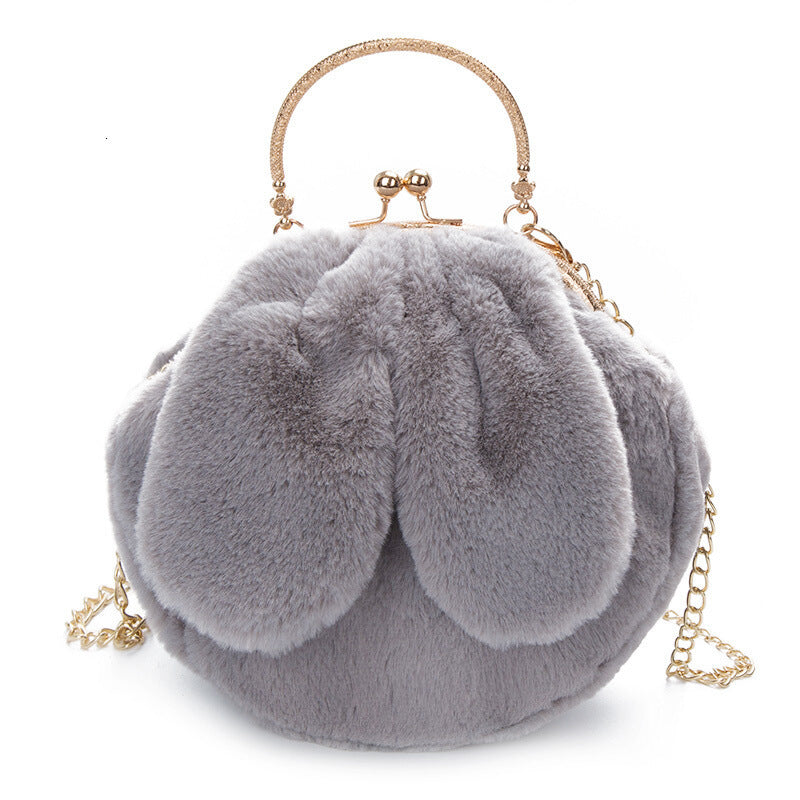 Plush Faux Rabbit Fur Bag with Clip - Premium Plush Faux Rabbit Fur Bag with Clip from Concordia Style Boutique - Just $16.89! Shop now at Concordia Style Boutique