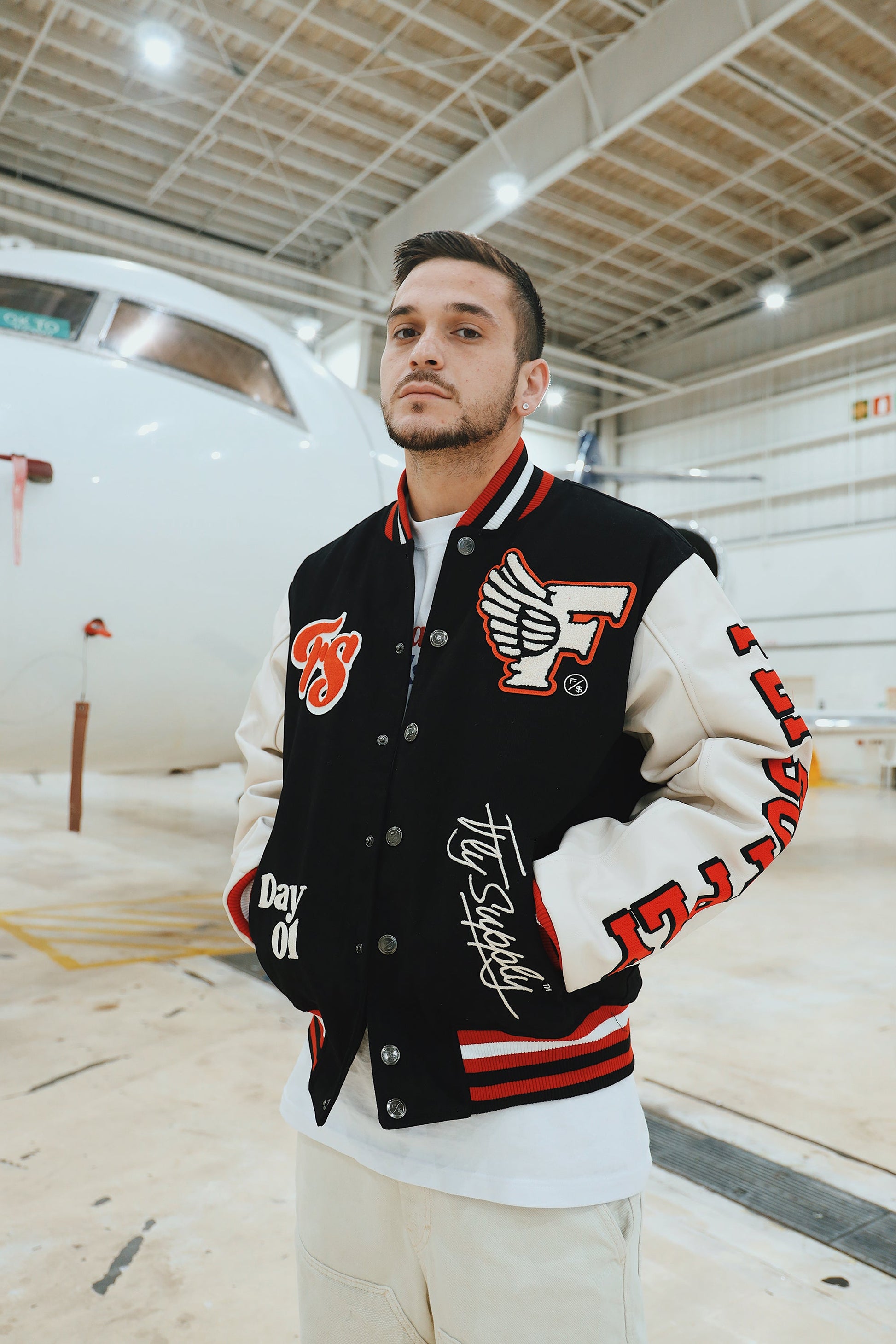 Manifest Varsity Jacket (Black) - Concordia Style Boutique