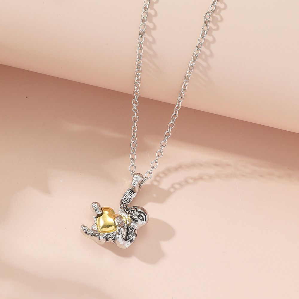 HEART HUGGING SLOTH NECKLACE - Concordia Style Boutique