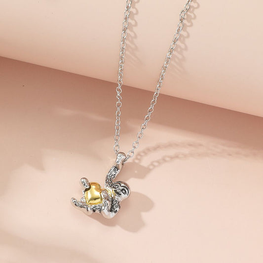 HEART HUGGING SLOTH NECKLACE - Concordia Style Boutique
