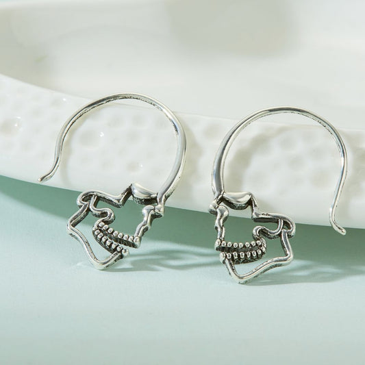 SILVER SKULL HOOP EARRINGS (PAIR) - Concordia Style Boutique