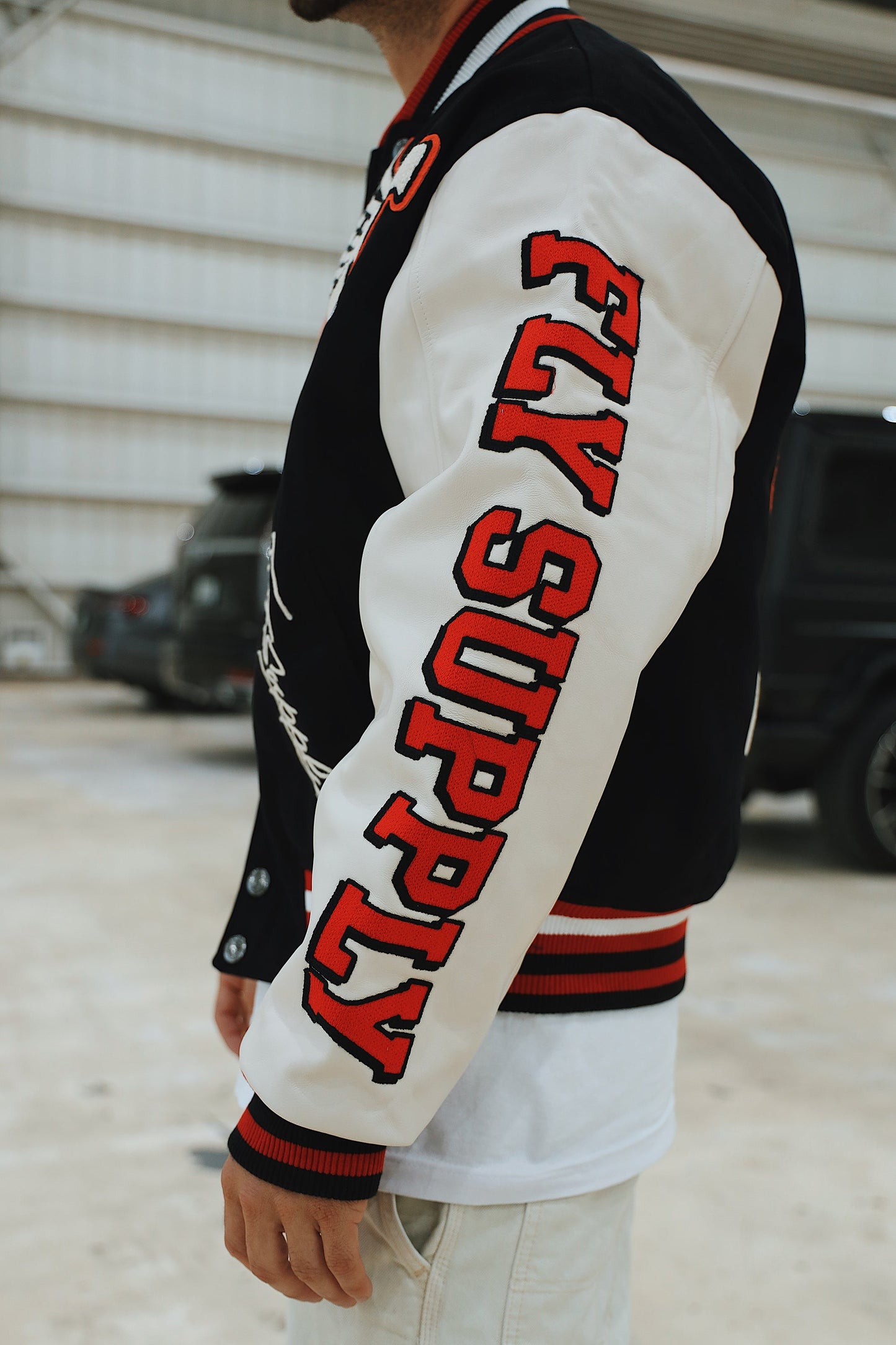 Manifest Varsity Jacket (Black) - Concordia Style Boutique
