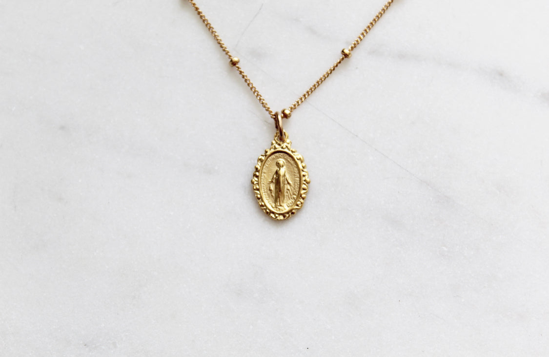 Intricate Miraculous medal necklace