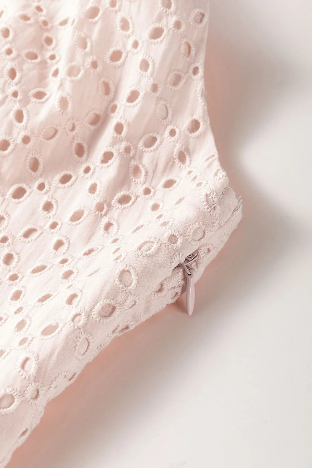 Embroidered Eyelets Ruffled Hem Sleeveless Mini Dress - Concordia Style Boutique