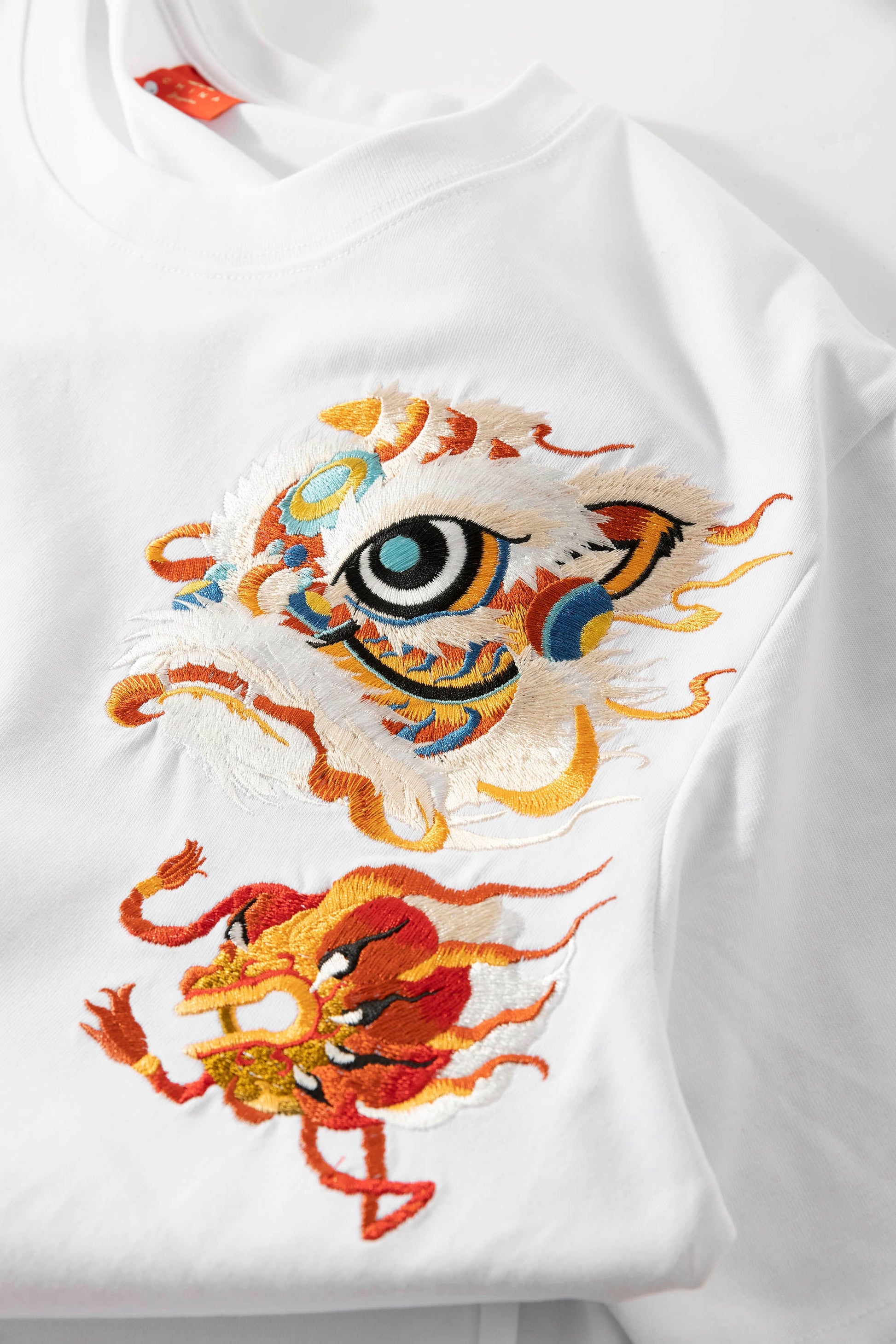 KH766 Lion Embroidery Tee - Concordia Style Boutique