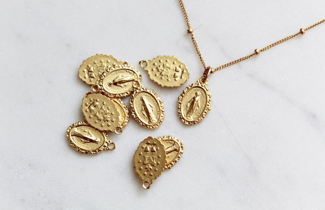 Intricate Miraculous medal necklace