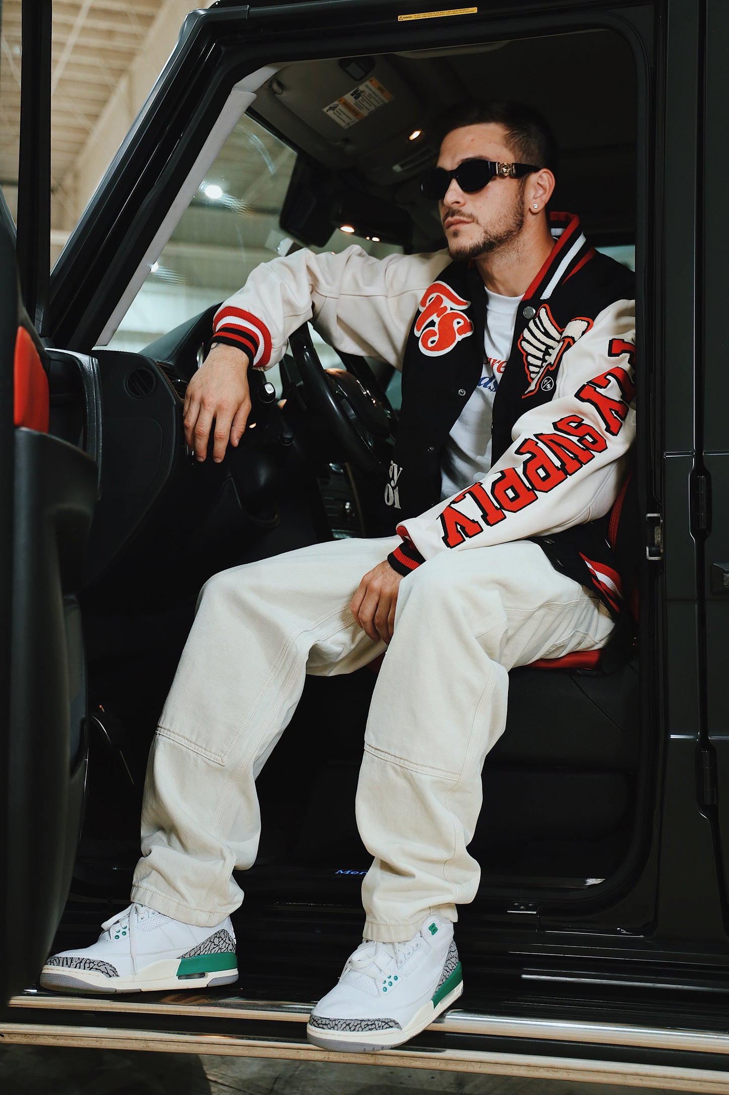 Manifest Varsity Jacket (Black) - Concordia Style Boutique