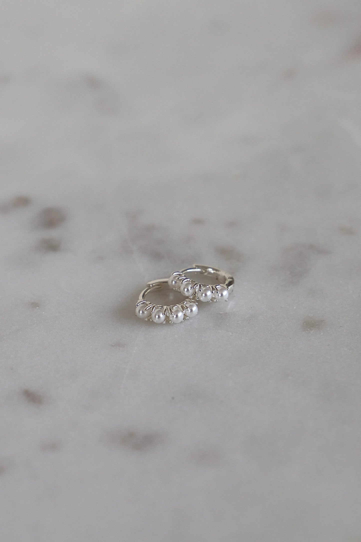 SILVER MINI PEARL HOOPS - Concordia Style Boutique