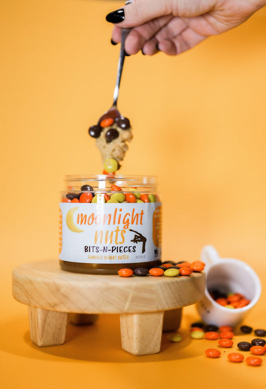 Bits-N-Pieces - White Chocolate Peanut Butter with Reese’s Pieces & Caramel - Concordia Style Boutique