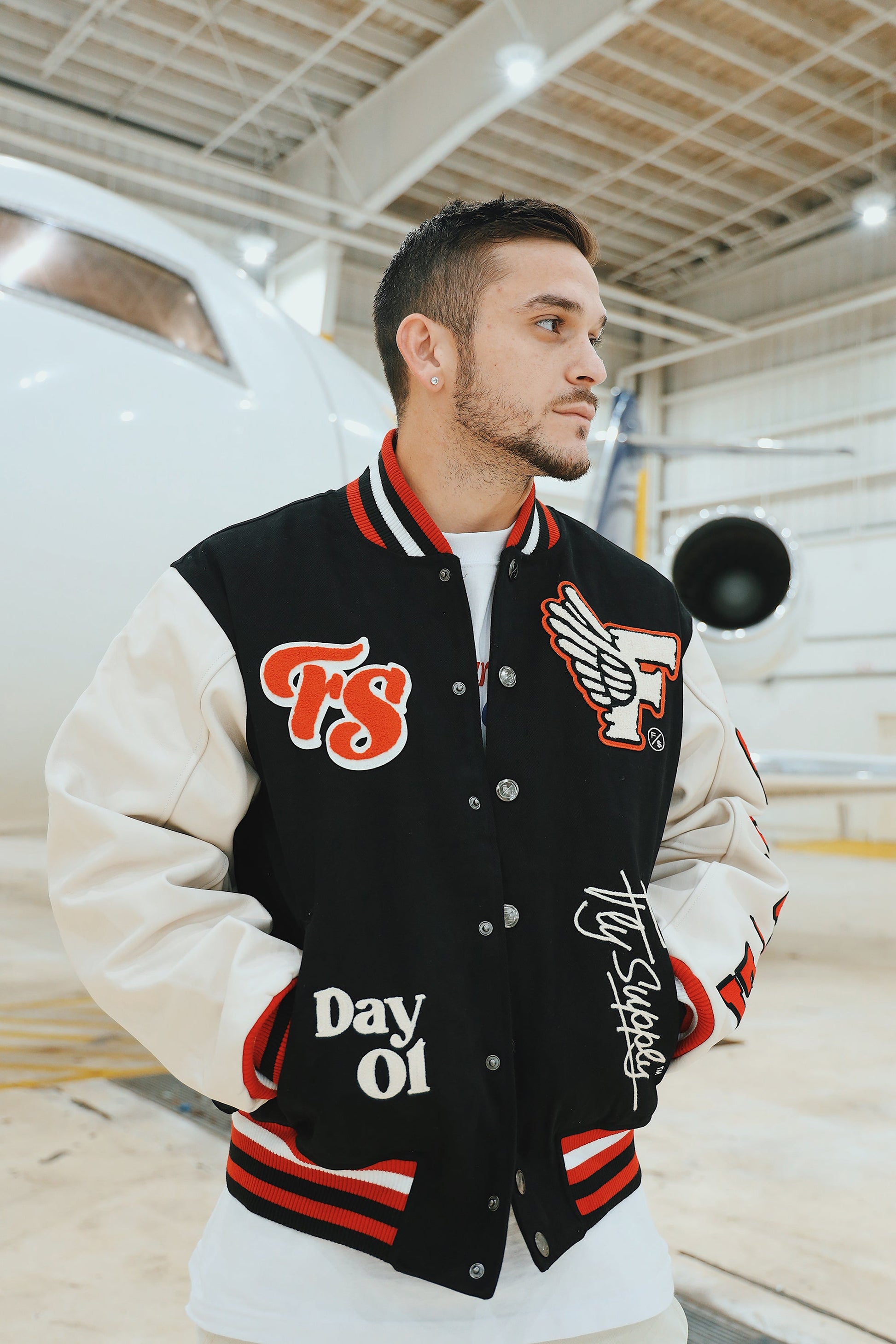 Manifest Varsity Jacket (Black) - Concordia Style Boutique