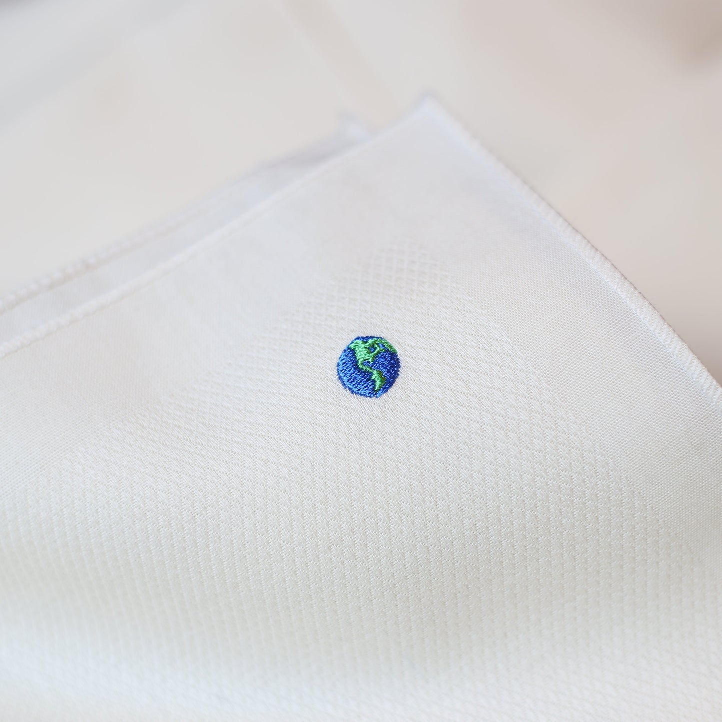 Our Extra-Soft, Extra-Sustainable Hanky with 🌎 Earth Embroidery
