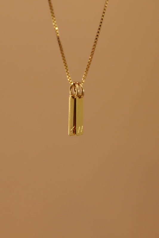 STAMPED INITIAL TAG CHARM - Concordia Style Boutique