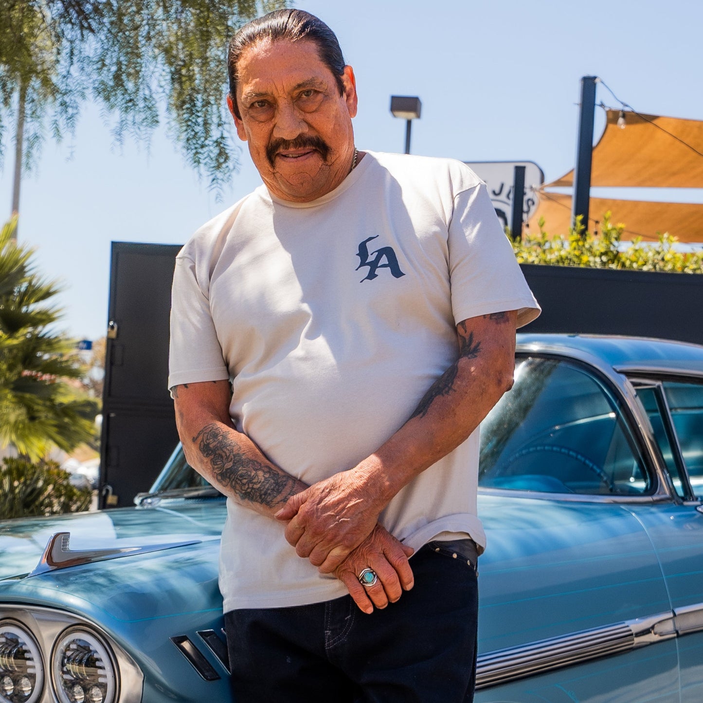 Beige T-Shirt with Machete Logo - Concordia Style Boutique