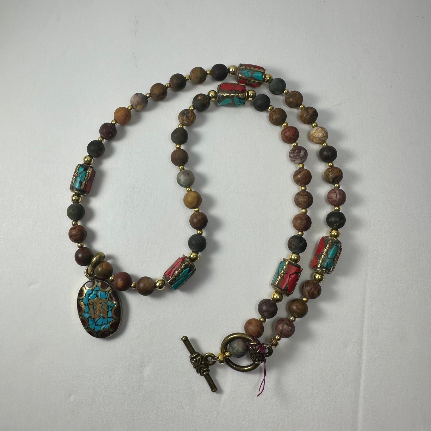 Turquoise & Red Coral Tibetan 'Om' Pendant on mixed Bead Necklace