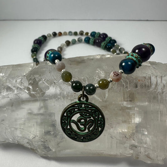 Bronze Patina 'Om' Pendant on Mixed Bead Necklace