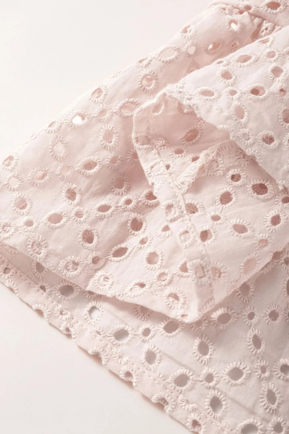 Embroidered Eyelets Ruffled Hem Sleeveless Mini Dress - Concordia Style Boutique