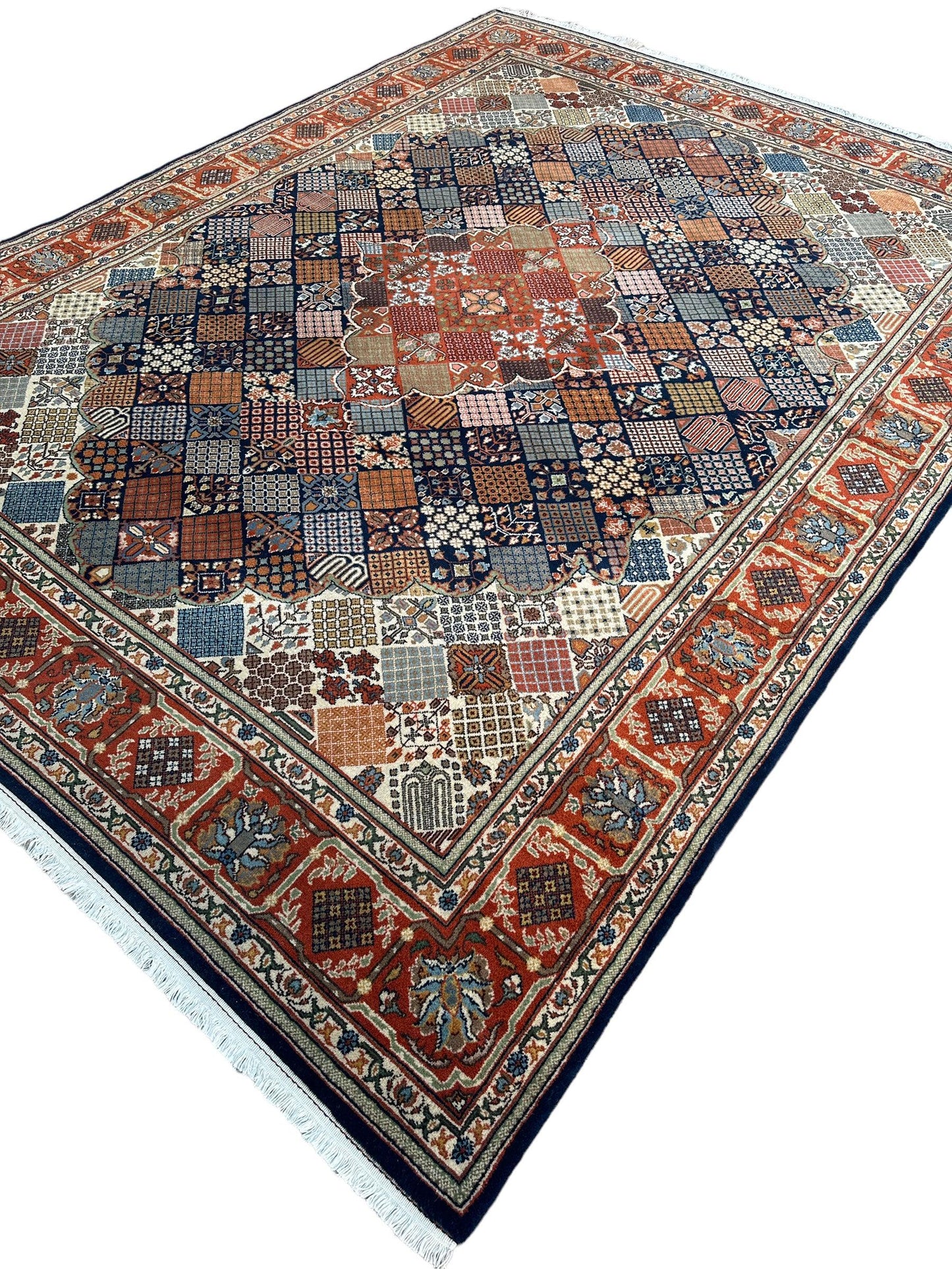 Hand-Knotted Indo-Joshegan Wool Rug – 12'2" x 9'1" – Geometric Medallion Design, Rich Warm Palette