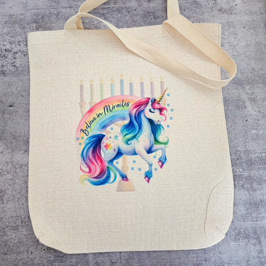 Believe in Miracles Unicorn Menorah Tote Bag