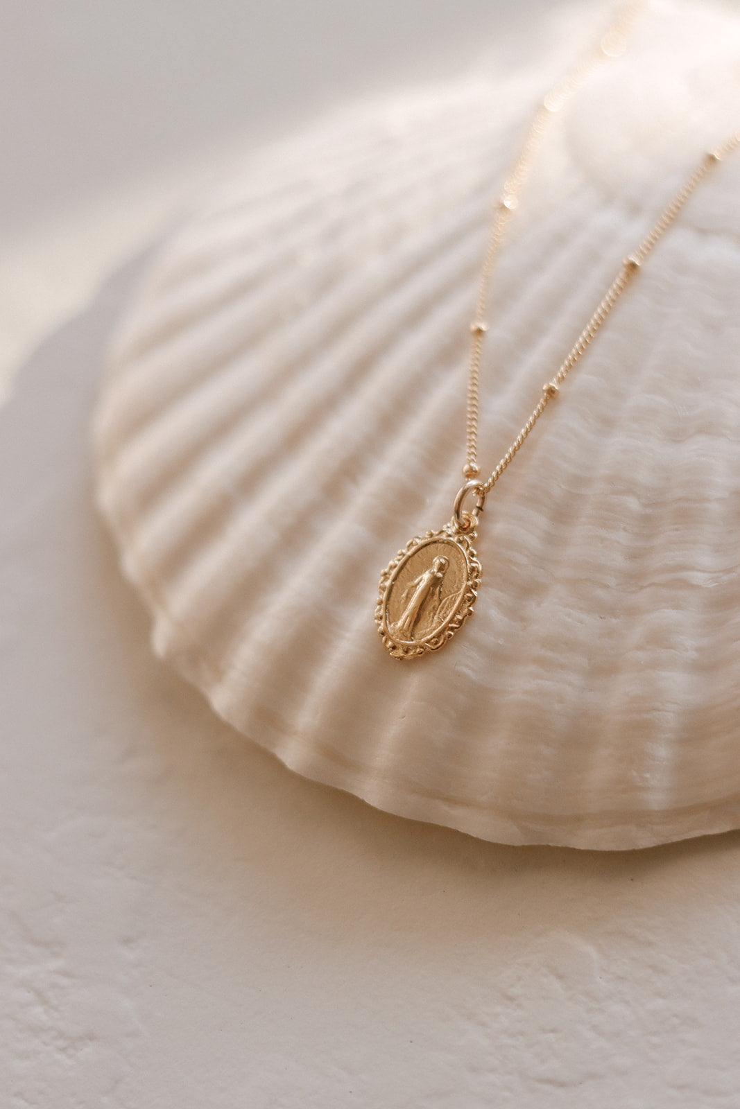 Intricate Miraculous medal necklace