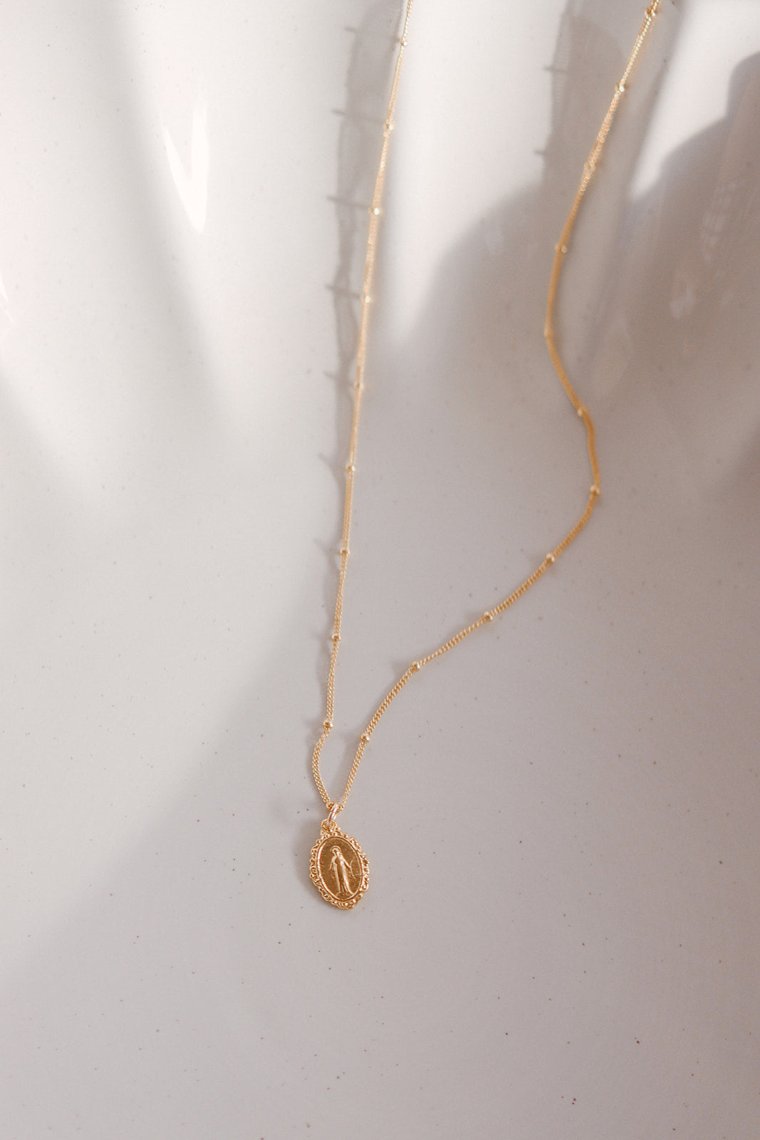 Intricate Miraculous medal necklace