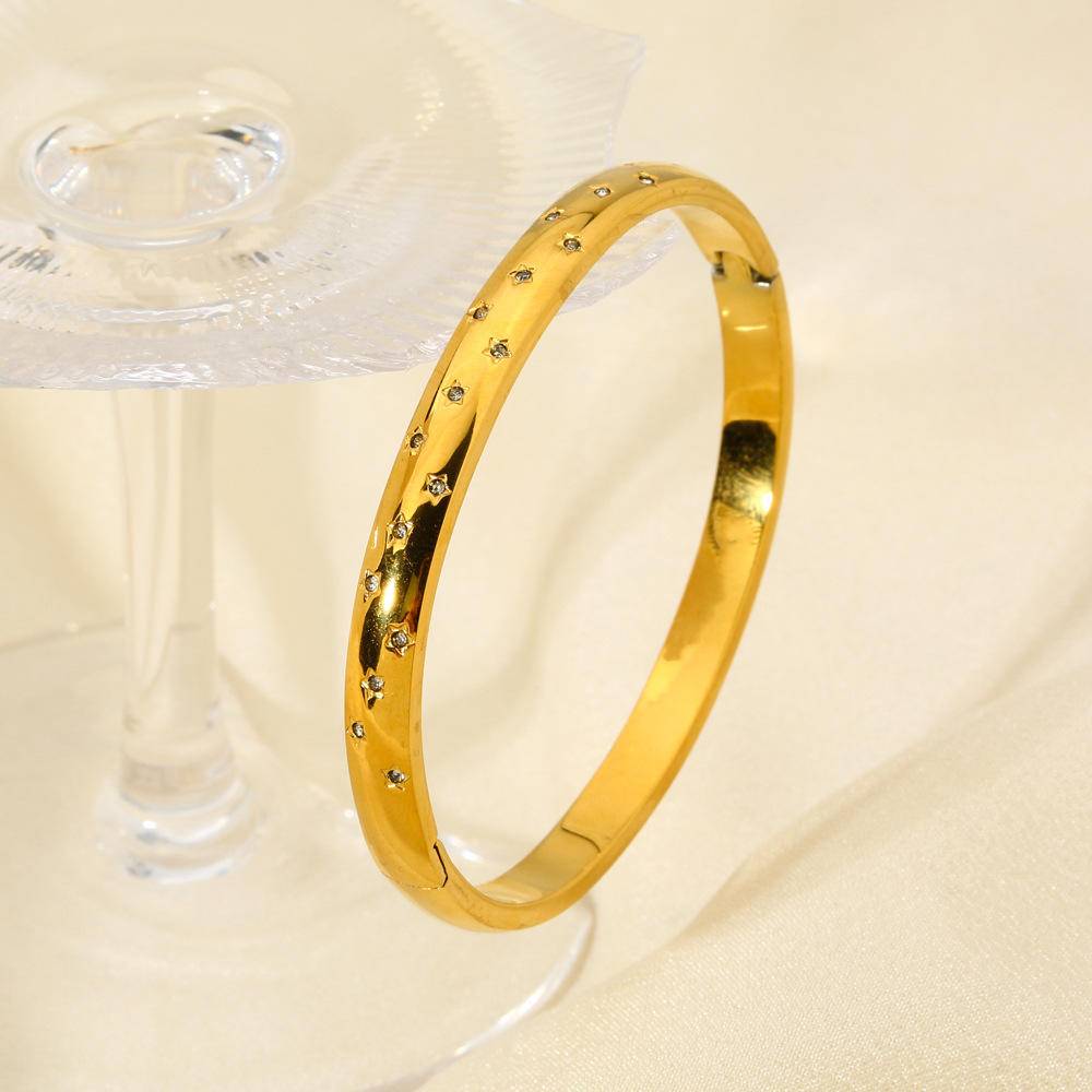 18K Gold Plated Star-Shaped Bangle (With Box) - Premium Bangles from Concordia Style Boutique - Just $10.12! Shop now at Concordia Style Boutique